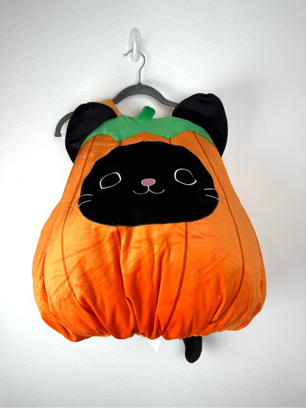 Squishmallows Calico Cat Pumpkin Costume with Black Face and Green Stem Accents